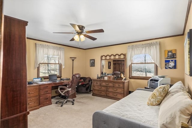 bedroom with crown molding, light carpet, and a ceiling fan