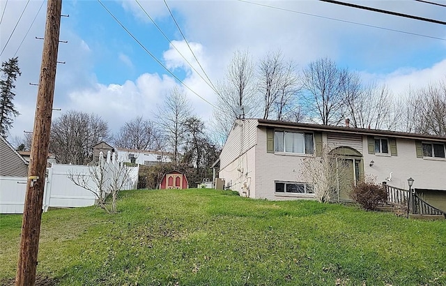 4216 Havencrest Dr, West Deer, PA 15044 - rear view of property with a storage shed, brick siding, and an outdoor structure