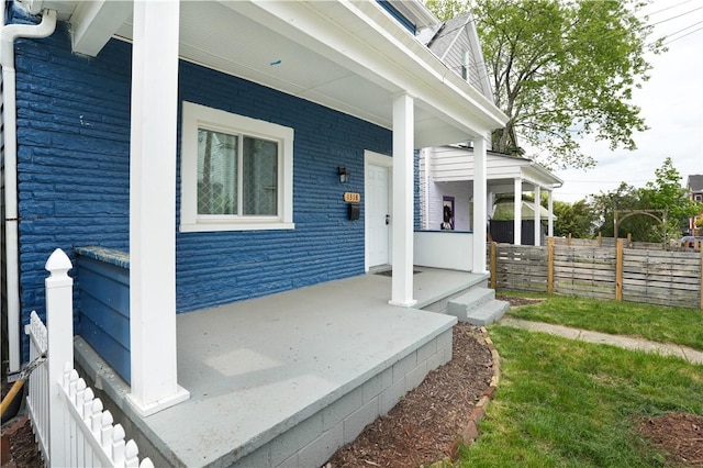 1318 Louise St, Munhall, PA 15120 - property entrance with covered porch and fence