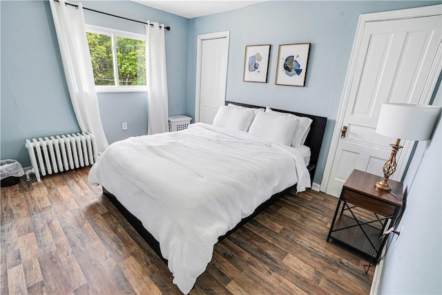 1318 Louise St, Munhall, PA 15120 - bedroom with radiator, wood finished floors, and baseboards