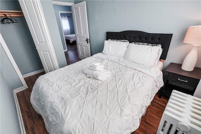 1318 Louise St, Munhall, PA 15120 - bedroom featuring dark wood-type flooring and baseboards