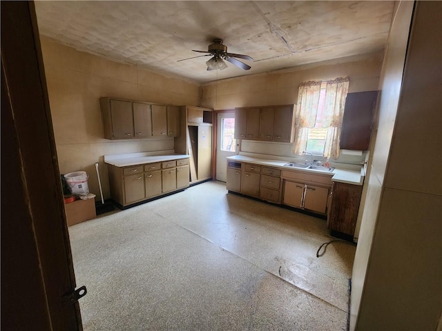 172 49th St, Lawrenceville, PA 15201 - kitchen featuring a sink, ceiling fan, and light countertops