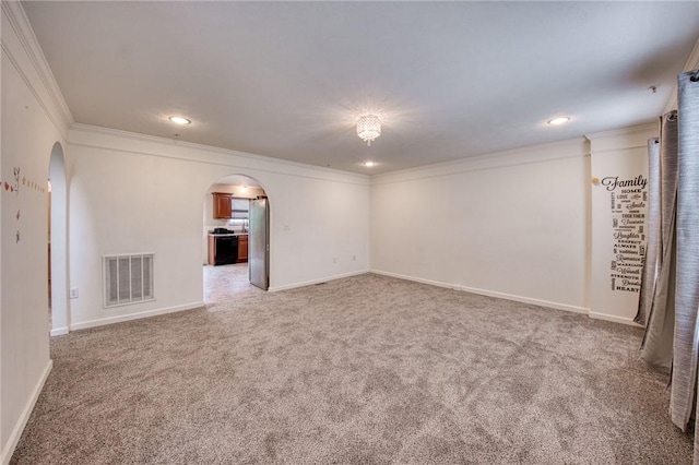 204 Ascot Ct, Moon/Crescent Twp, PA 15108 - empty room with crown molding, carpet, arched walkways, and visible vents