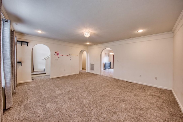 204 Ascot Ct, Moon/Crescent Twp, PA 15108 - empty room featuring crown molding, carpet flooring, and arched walkways