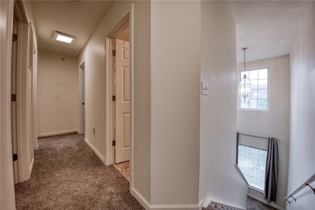 204 Ascot Ct, Moon/Crescent Twp, PA 15108 - hallway featuring baseboards, an upstairs landing, a chandelier, and carpet floors
