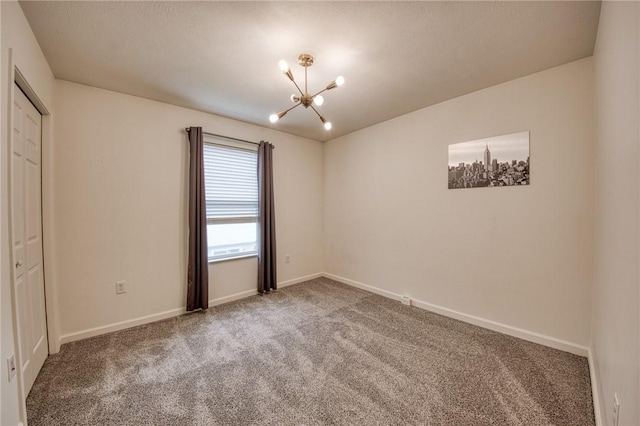 204 Ascot Ct, Moon/Crescent Twp, PA 15108 - unfurnished bedroom with carpet floors, a notable chandelier, baseboards, and a closet