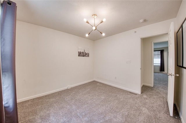 204 Ascot Ct, Moon/Crescent Twp, PA 15108 - carpeted empty room with a notable chandelier, baseboards, and visible vents