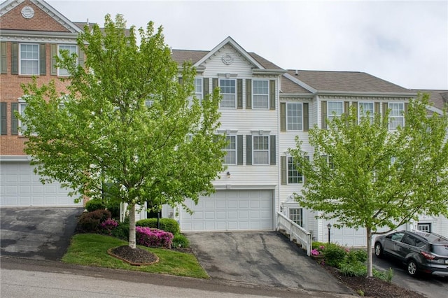 204 Ascot Ct, Moon/Crescent Twp, PA 15108 - townhome / multi-family property featuring aphalt driveway and an attached garage