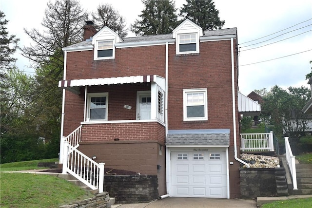 view of property featuring a chimney and brick siding