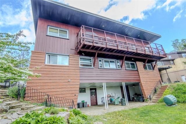 1898 Brushcliff Rd, Churchill Boro, PA 15221 - rear view of house with a patio area and stairway