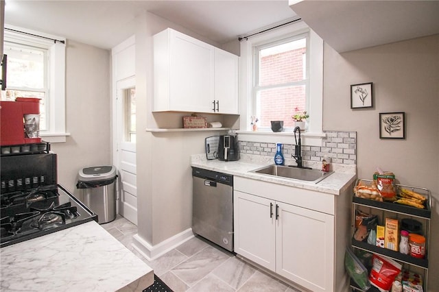 2805 Louisiana Ave, Dormont, PA 15216 - kitchen featuring stainless steel dishwasher, light countertops, white cabinetry, backsplash, and light marble finish floors