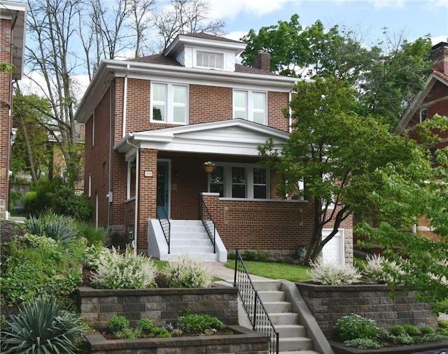 traditional style home with a chimney, stairway, a porch, and brick siding