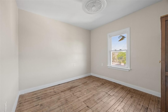5611 Wickliff St, Lawrenceville, PA 15201 - unfurnished room with baseboards, hardwood / wood-style floors, and visible vents