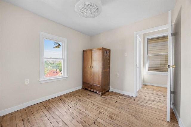 5611 Wickliff St, Lawrenceville, PA 15201 - unfurnished bedroom with visible vents, light wood-style flooring, and baseboards