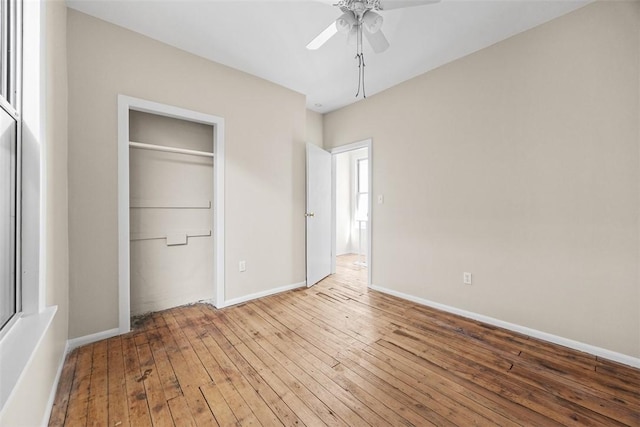 5611 Wickliff St, Lawrenceville, PA 15201 - unfurnished bedroom with baseboards, a closet, wood-type flooring, and a ceiling fan