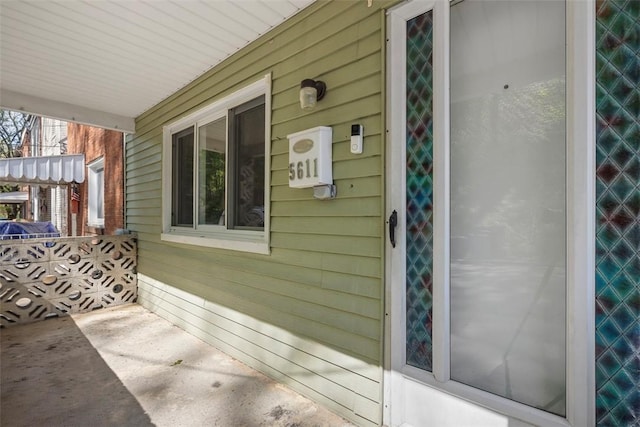 5611 Wickliff St, Lawrenceville, PA 15201 - view of side of property featuring covered porch