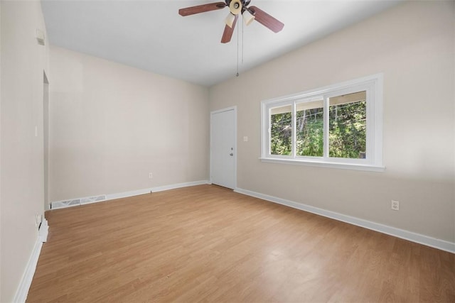 5611 Wickliff St, Lawrenceville, PA 15201 - unfurnished room with light wood-style flooring, baseboards, a ceiling fan, and visible vents