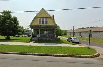 431 N Main St, Masontown, PA 15461 - view of front facade with a front lawn and covered porch