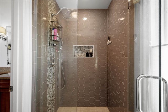 bathroom featuring a stall shower