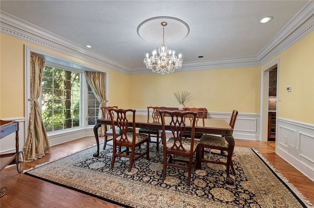 1609 Blackburn Heights Dr, Franklin Park, PA 15143 - dining room with an inviting chandelier, crown molding, wainscoting, and wood finished floors