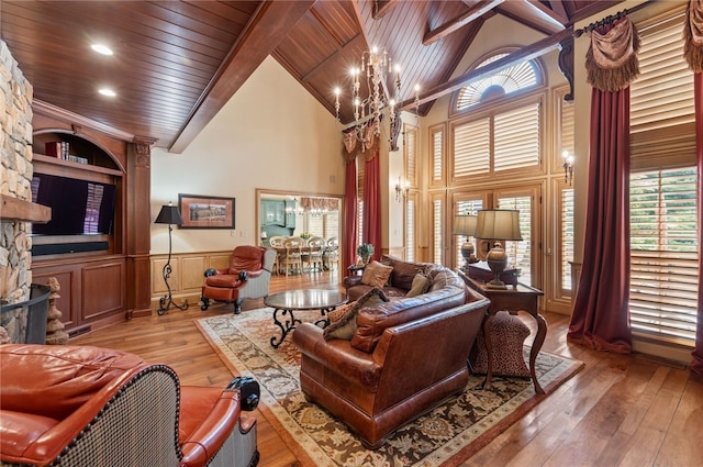 1609 Blackburn Heights Dr, Franklin Park, PA 15143 - living room with a notable chandelier, wooden ceiling, light wood finished floors, wainscoting, and high vaulted ceiling