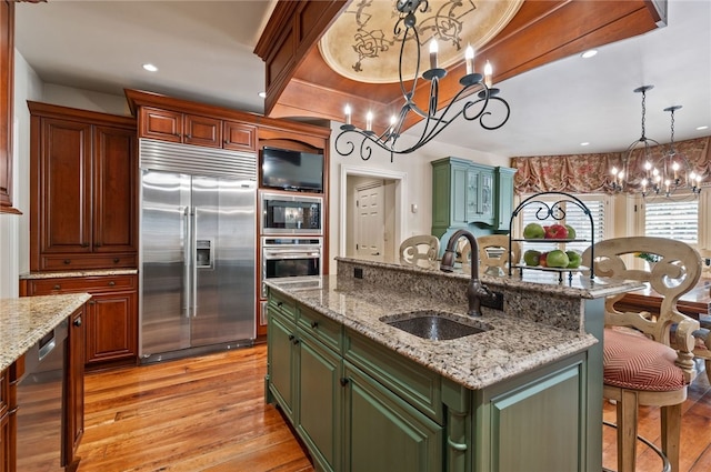 1609 Blackburn Heights Dr, Franklin Park, PA 15143 - kitchen with green cabinetry, built in appliances, and a sink