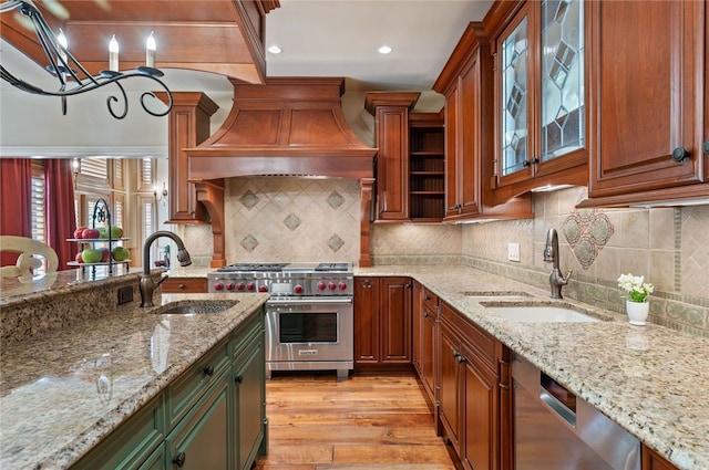 1609 Blackburn Heights Dr, Franklin Park, PA 15143 - kitchen with a sink, light stone countertops, light wood-style floors, and appliances with stainless steel finishes