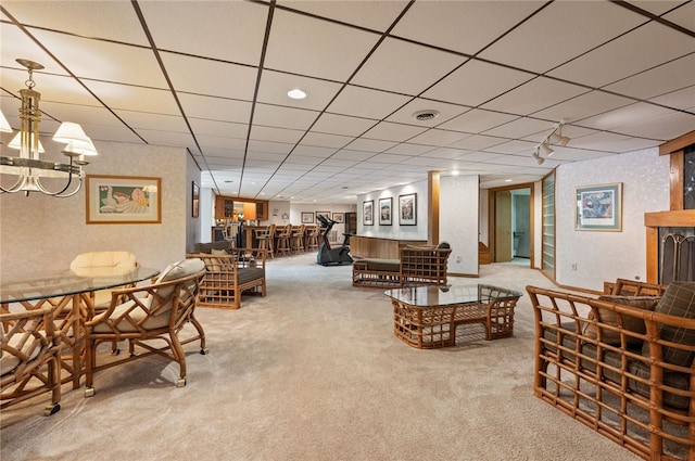 1609 Blackburn Heights Dr, Franklin Park, PA 15143 - carpeted living area with a dry bar, a notable chandelier, a paneled ceiling, and visible vents