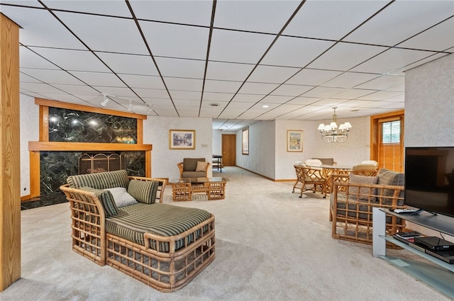 1609 Blackburn Heights Dr, Franklin Park, PA 15143 - carpeted living room featuring a drop ceiling and a notable chandelier