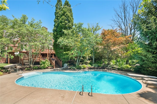 1609 Blackburn Heights Dr, Franklin Park, PA 15143 - pool with a wooden deck, stairs, a diving board, and a patio area