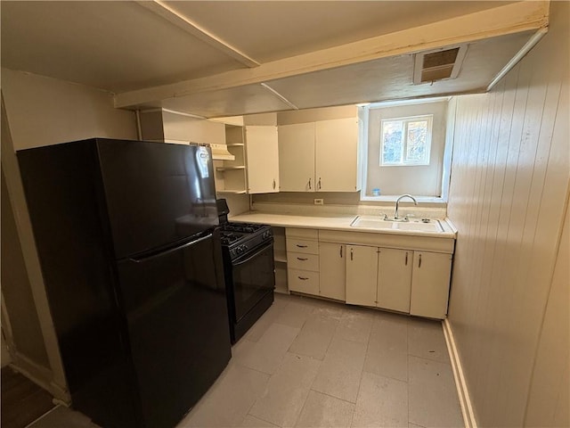 2345 Perrysville Ave, Perry Hilltop, PA 15214 - kitchen featuring exhaust hood, a sink, black appliances, light countertops, and white cabinets