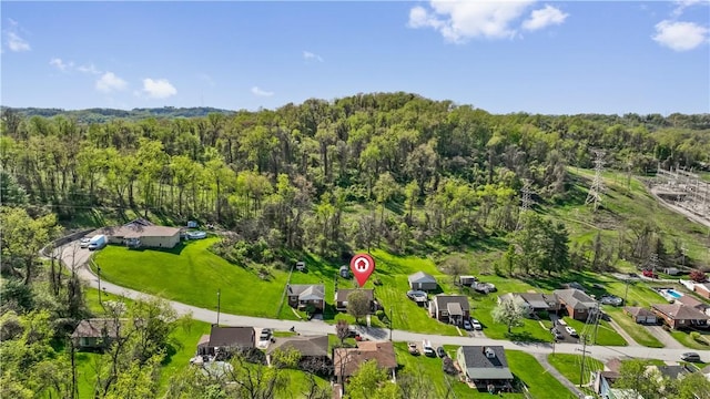aerial view with a forest view and a residential view