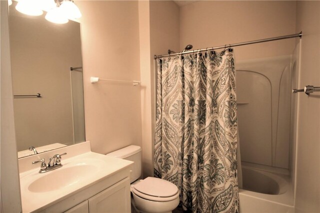 900 Hidden Ridge Ct Unit 202, South Park, PA 15129 - full bathroom with toilet, vanity, and shower / bathtub combination with curtain