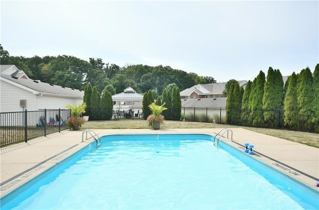 view of pool featuring fence and a fenced in pool