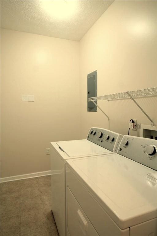 900 Hidden Ridge Ct Unit 202, South Park, PA 15129 - laundry room with washing machine and clothes dryer, electric panel, and baseboards