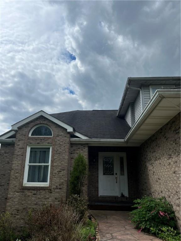 200 Holyoke Rd, Center Twp But, PA 16001 - property entrance featuring brick siding