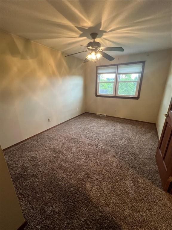 200 Holyoke Rd, Center Twp But, PA 16001 - empty room featuring a ceiling fan, baseboards, and carpet