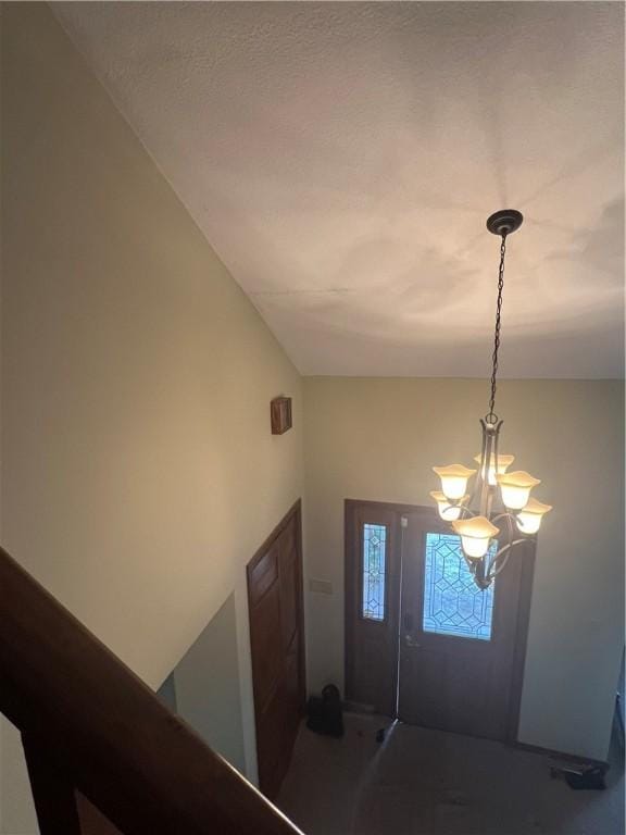 200 Holyoke Rd, Center Twp But, PA 16001 - foyer featuring a notable chandelier