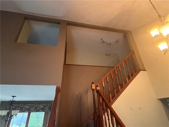200 Holyoke Rd, Center Twp But, PA 16001 - stairway with an inviting chandelier