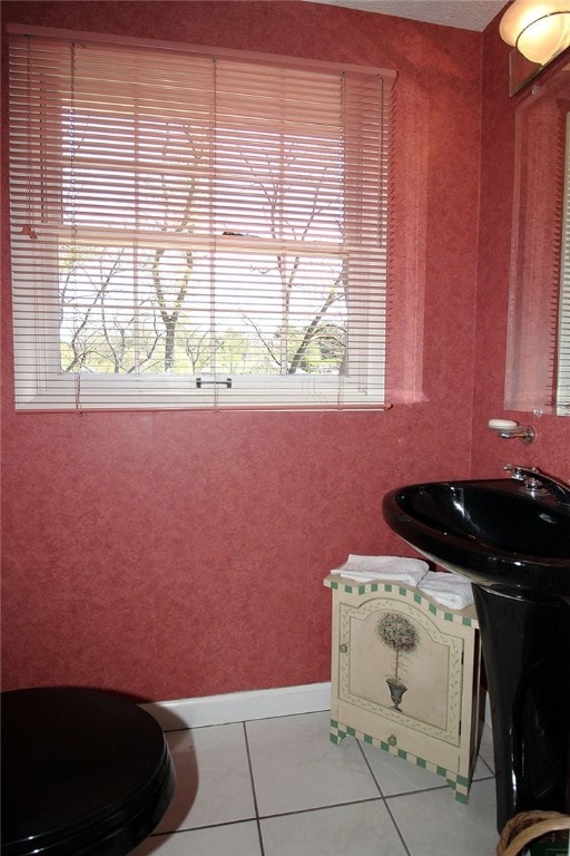 bathroom featuring baseboards