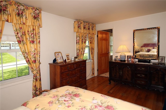 bedroom with wood finished floors