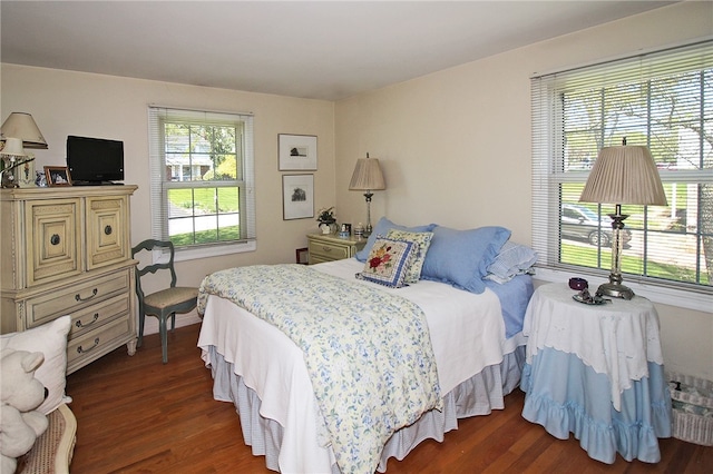 bedroom with wood finished floors