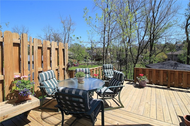 deck featuring outdoor dining area