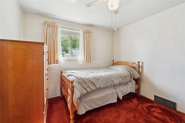 bedroom featuring carpet flooring and visible vents