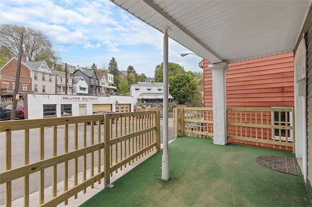 view of patio / terrace with a fenced backyard and a residential view