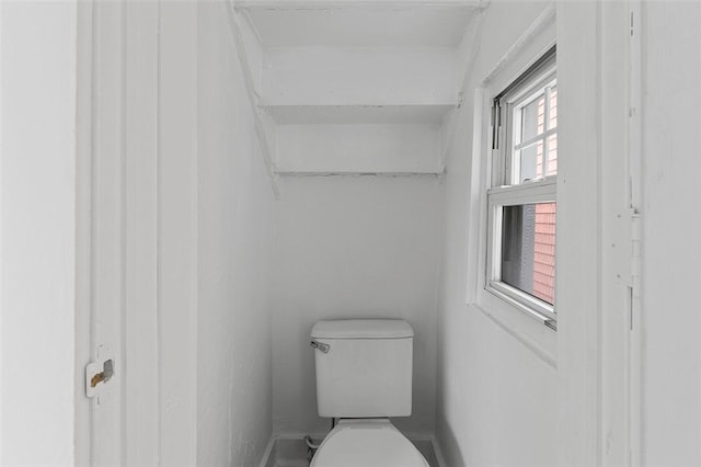 bathroom featuring toilet