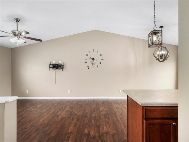 105 Luzerne Ave, South Union Twp, PA 15401 - unfurnished dining area with baseboards, ceiling fan, dark wood-style floors, and vaulted ceiling