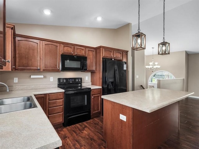 105 Luzerne Ave, South Union Twp, PA 15401 - kitchen with dark wood-style flooring, a sink, a chandelier, black appliances, and light countertops