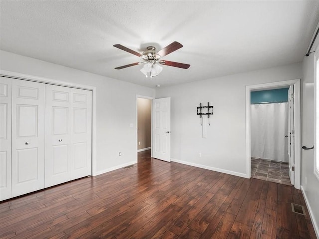 105 Luzerne Ave, South Union Twp, PA 15401 - unfurnished bedroom featuring baseboards, hardwood / wood-style floors, a closet, and visible vents