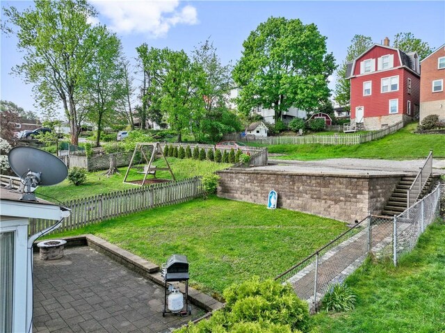 73 Hempstead Ave, West View, PA 15229 - view of yard with an outdoor fire pit and a fenced backyard